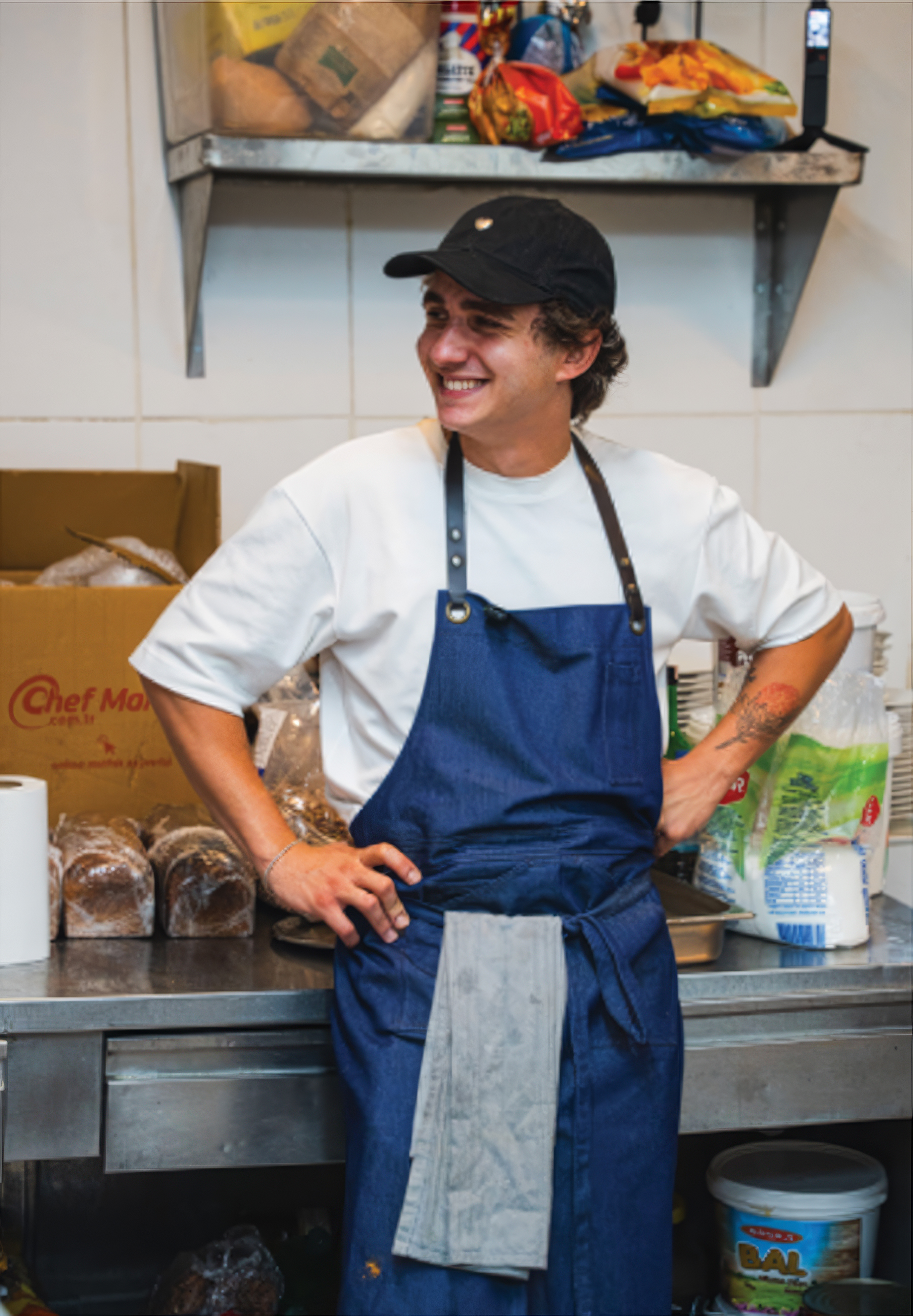 Ulaş Durmaz at the open-air kitchen at Perdue