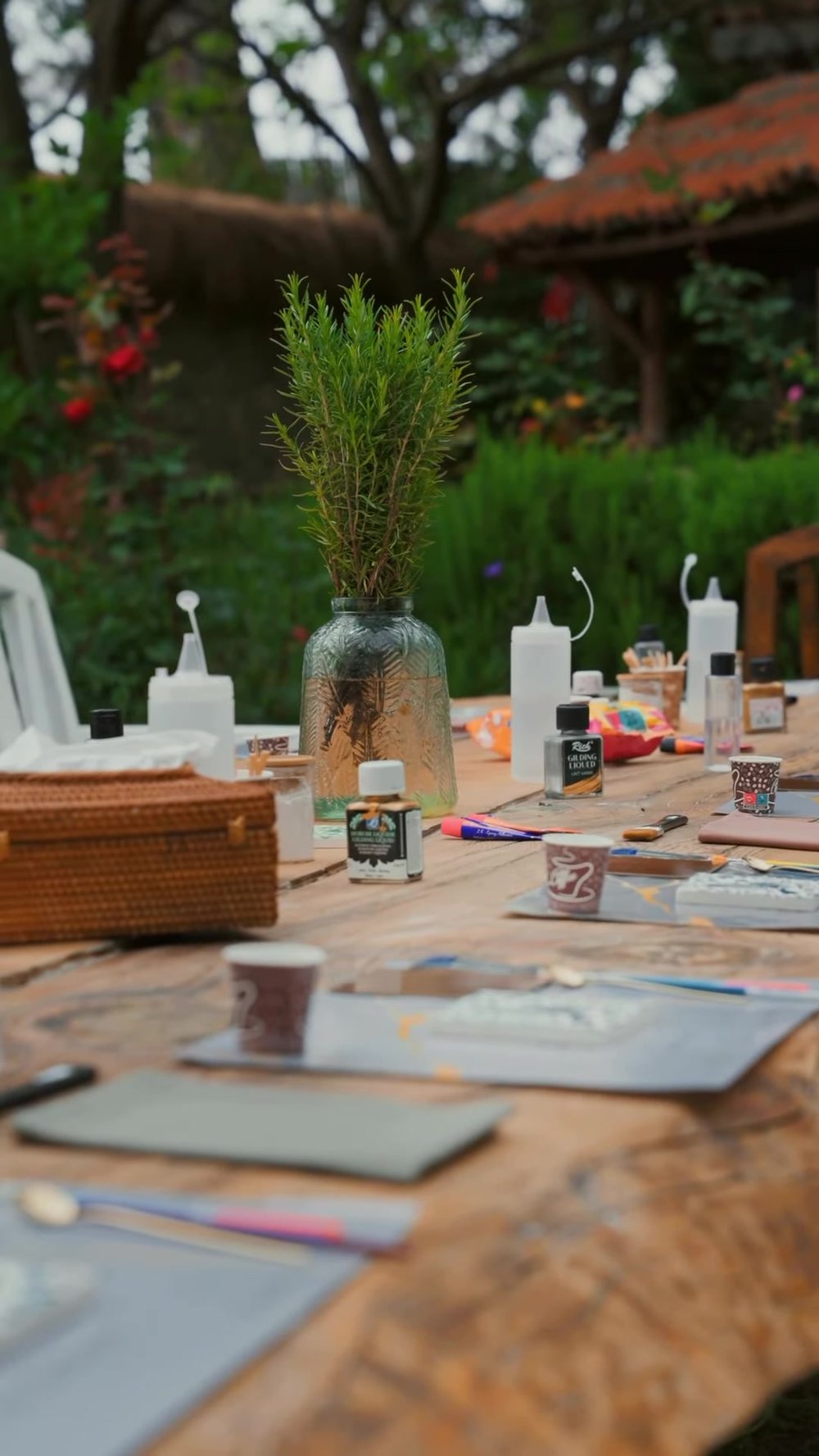 The long table set for the workshop in the garden